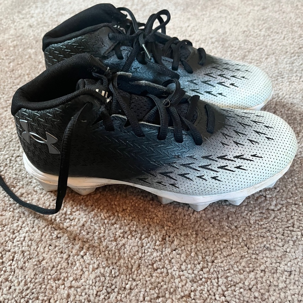 Under Armour Kids Black and White cleats